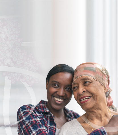 Photo: 2 women in supportive embrace: we are working to make a difference for caregivers of patients w/endocrine rare disease & cancer